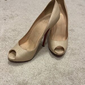 Christian Louboutin Cream Heels with Peep-Toe Design and Stiletto Style